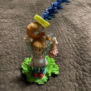 Girl Figurine with Red Shoes and lettuce Base